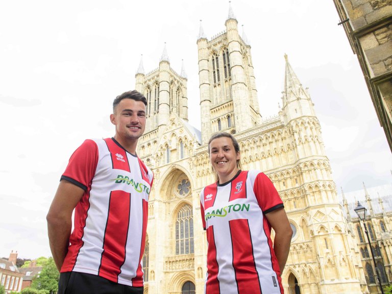 Chris Vaughan Photography - case study: Lincoln City | Lincoln City's Regan Poole and Lincoln City Women's Amy Kay photographed outside Lincoln Cathedral.