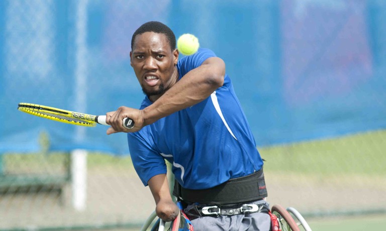 Chris Vaughan Photography - Sports images | Triple amputee Lucas Sithole during a tennis match.